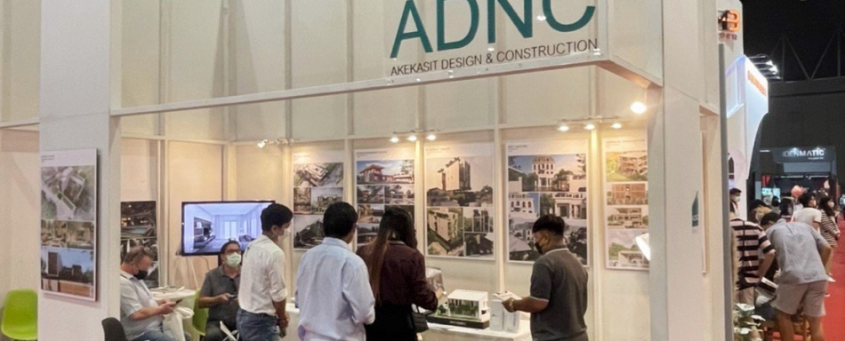 Team discussing at a booth